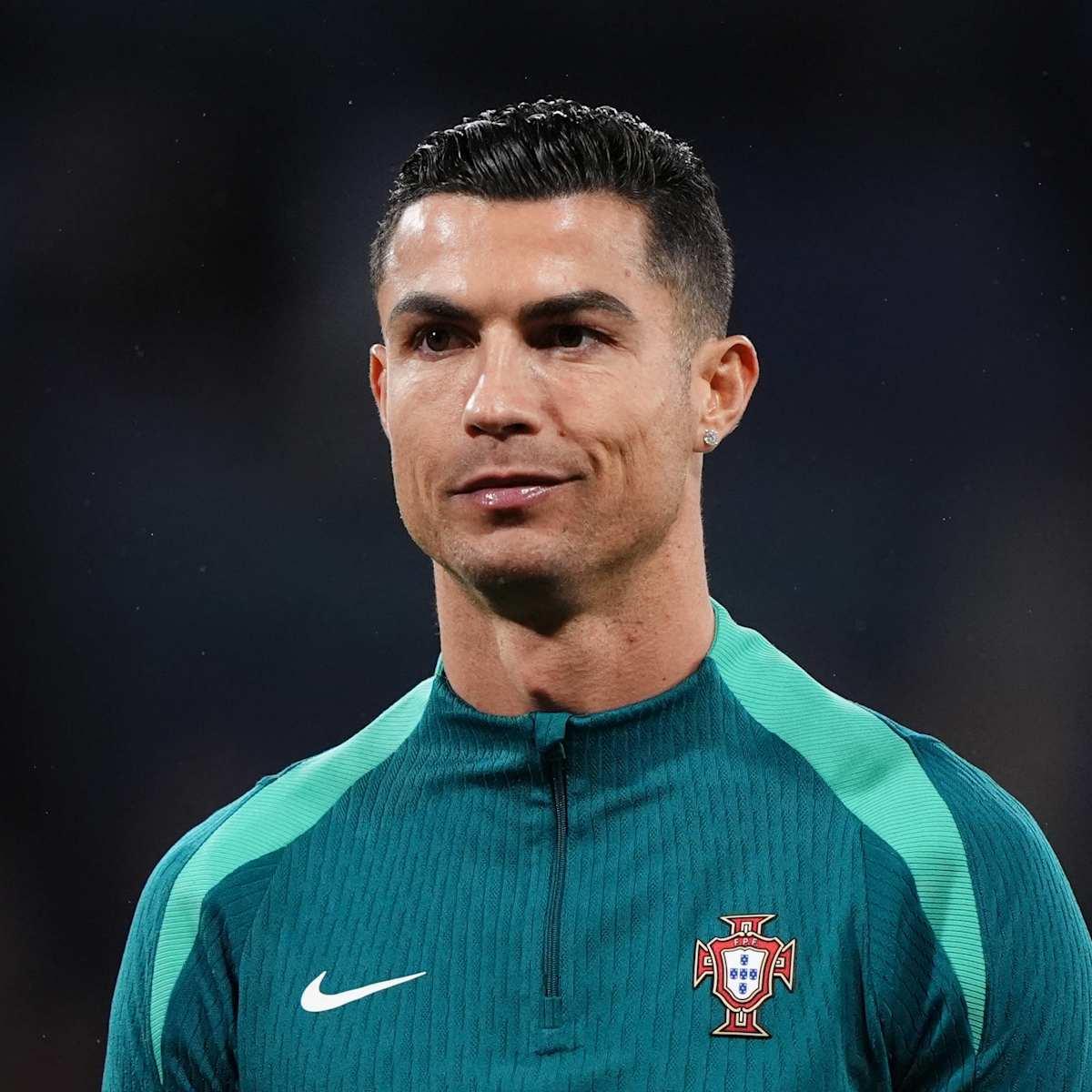 Cristiano Ronaldo wearing a Portugal team training jacket during an international football appearance.