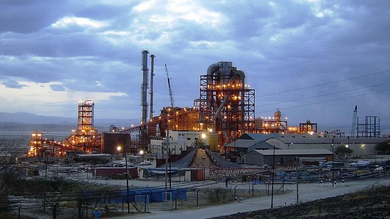Industrial processing facilities at a soda ash plant illustrating the Tata Chemicals Magadi operations dispute.